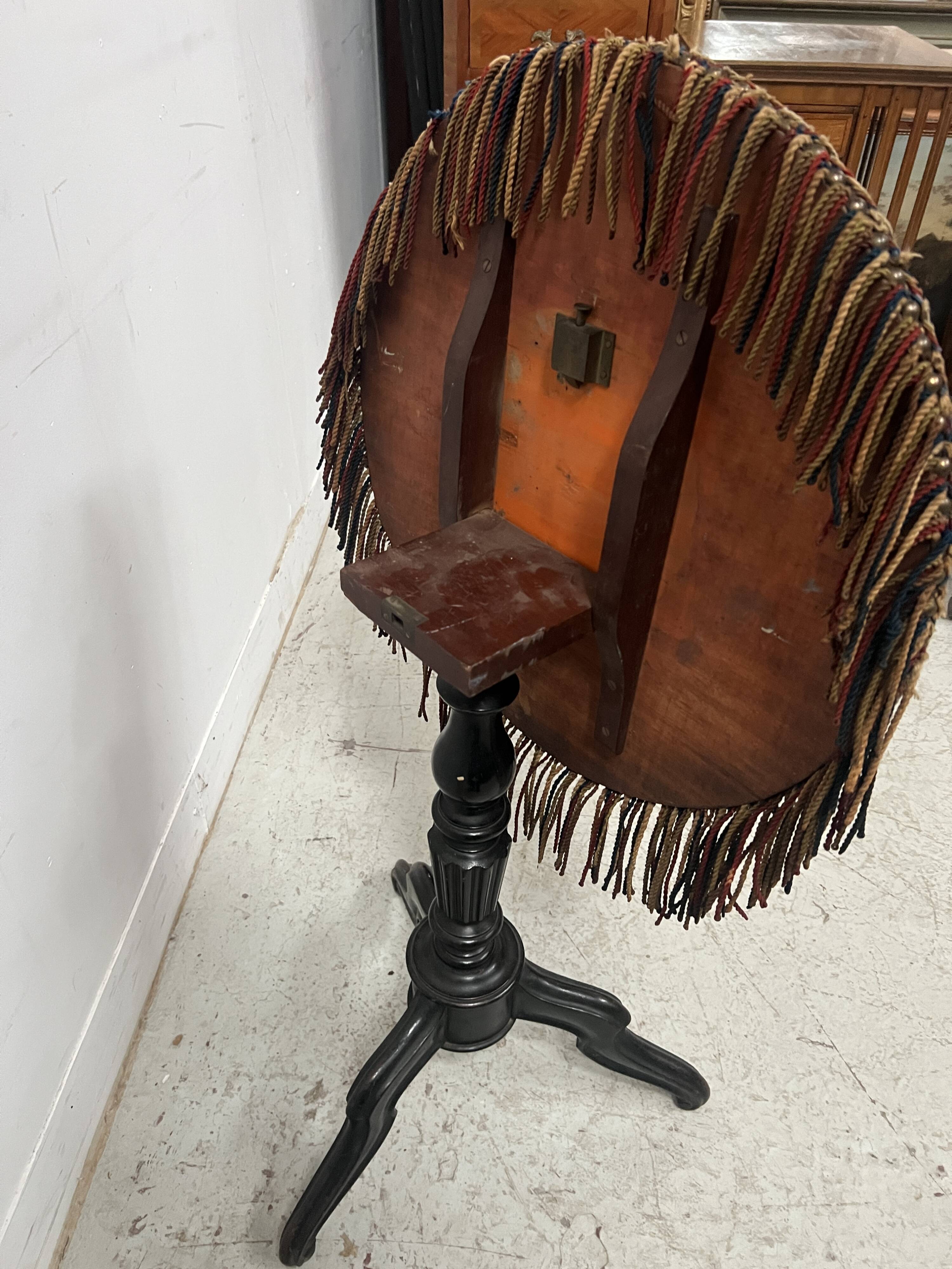 Napoleon III tilting side table in blackened wood, 19th century