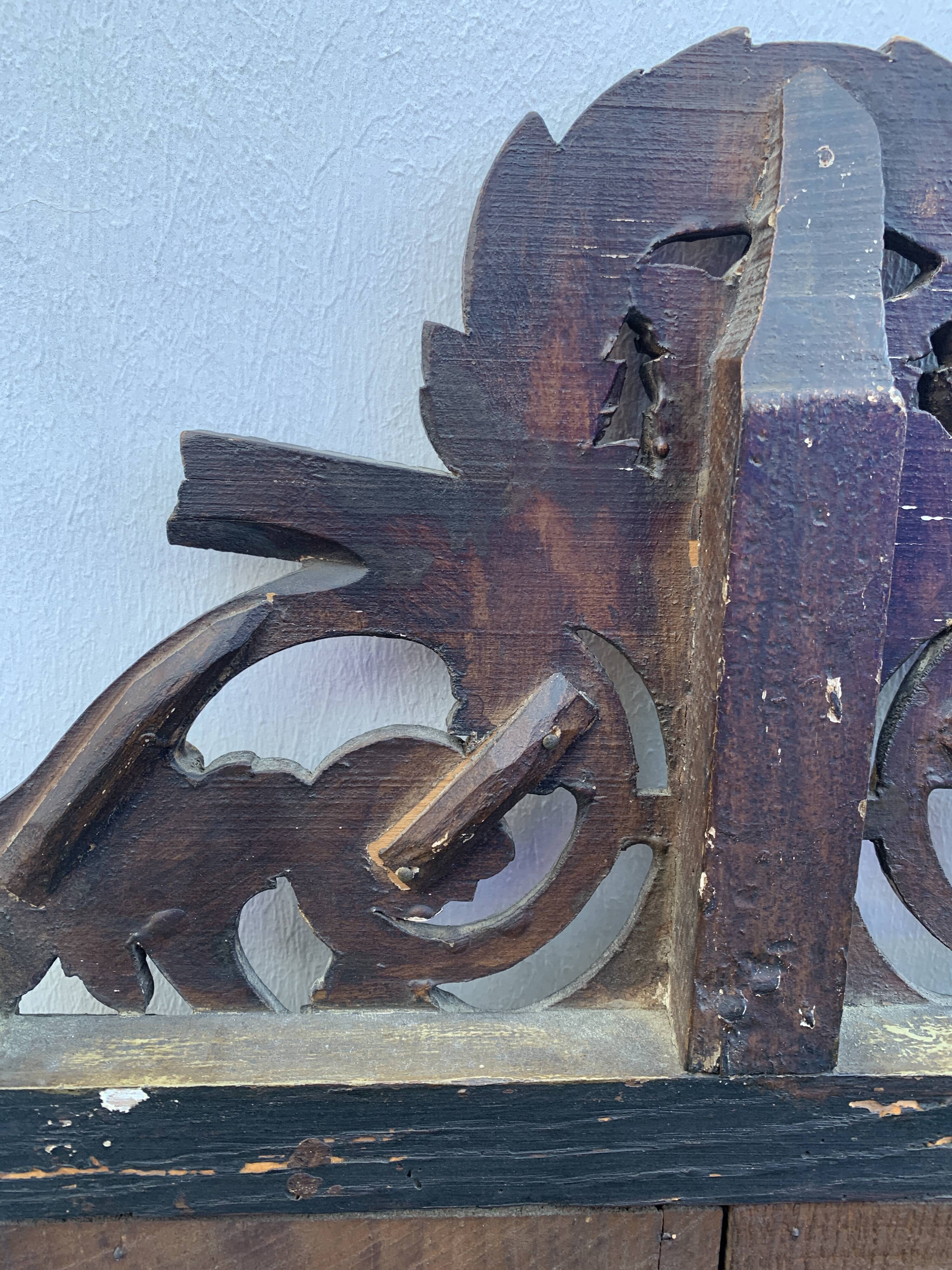 Antique mirror with gilded wood pediment, Louis XVI style