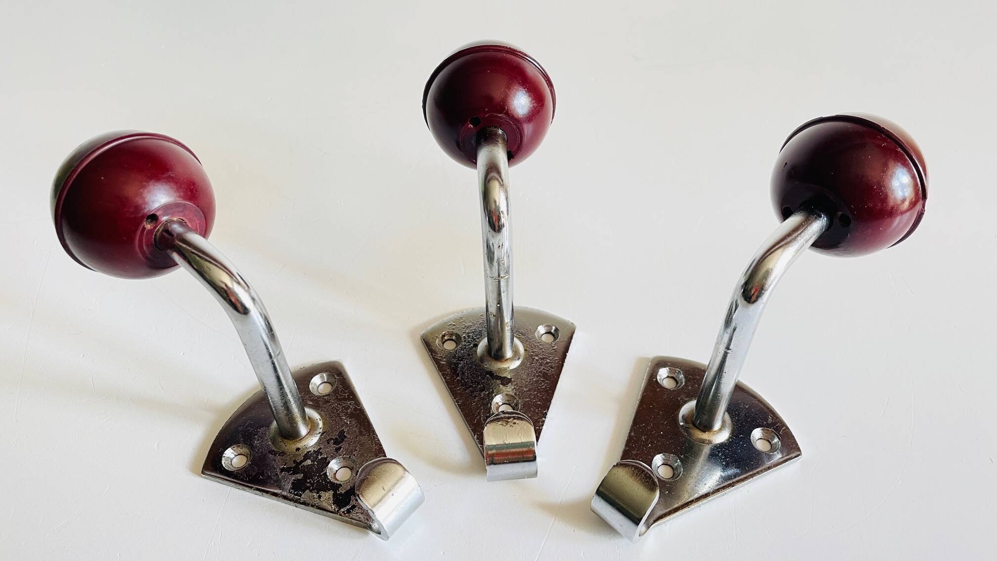 Chrome and bakelite coat hooks from the 70s