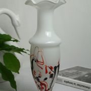 Corolla vase in white opaline with orange-brown patterns.