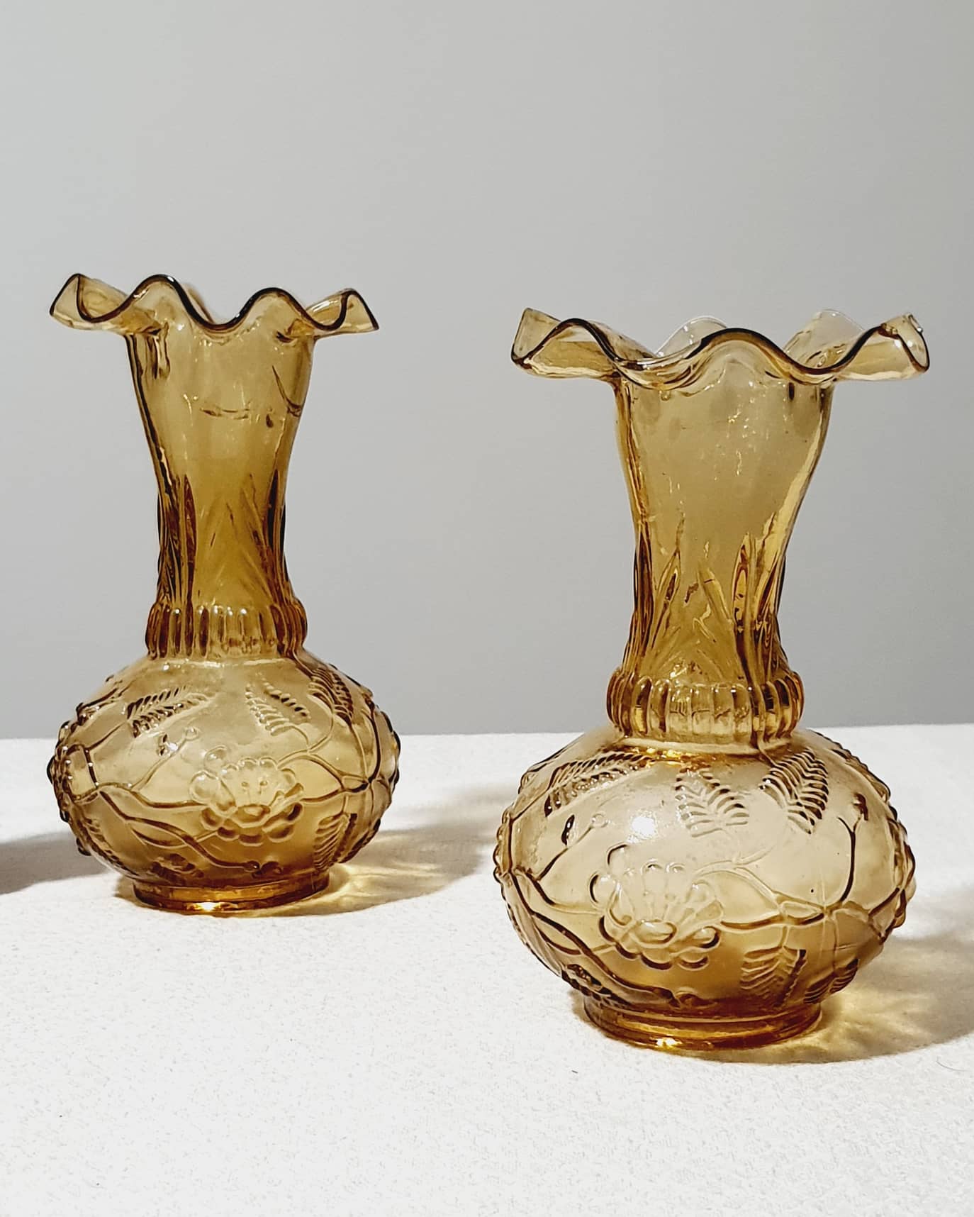 Vintage moulded amber glass vases