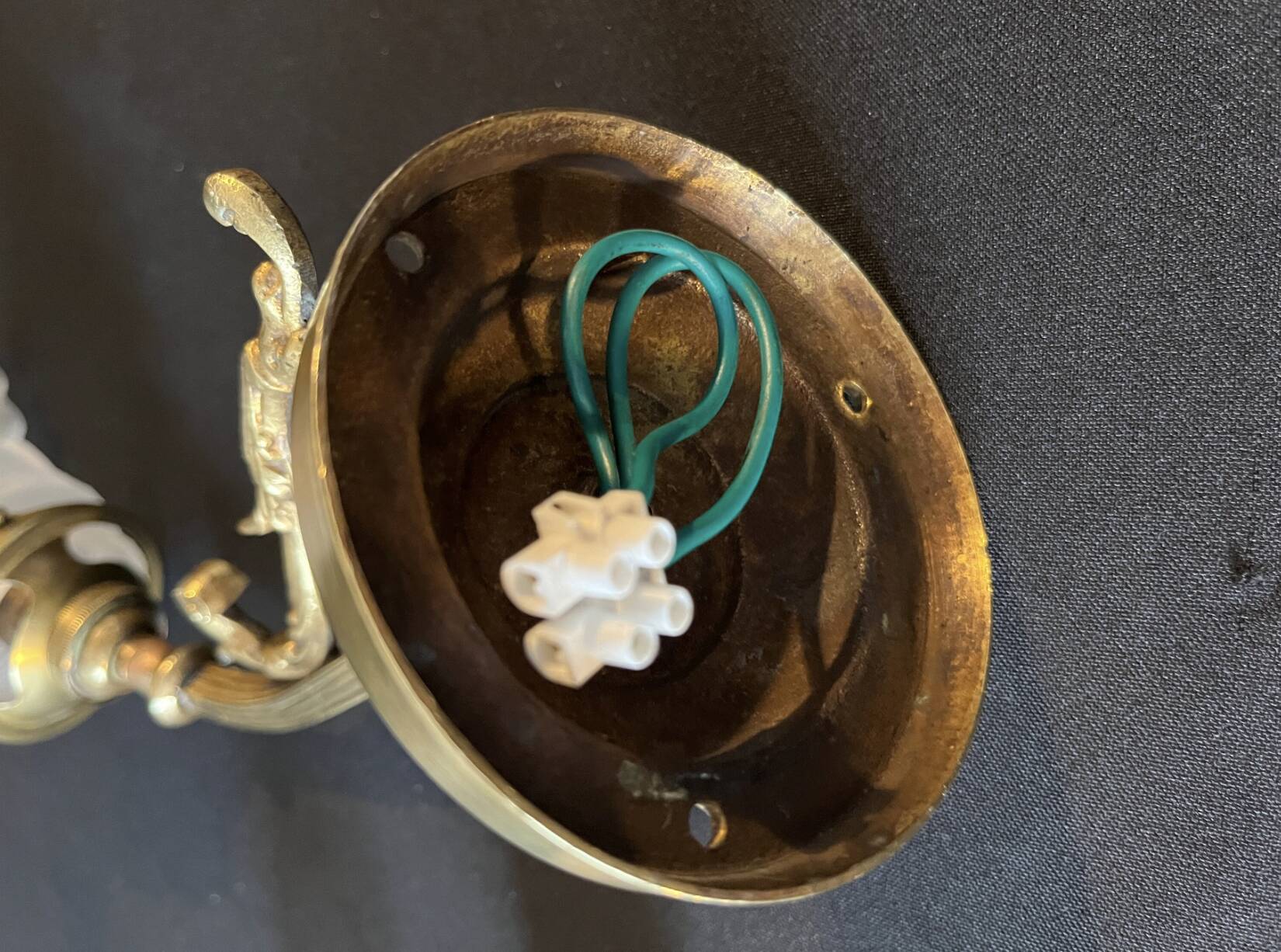 20th century Louis XVI style swan neck wall light in arabesque bronze and pleated glass tulip.