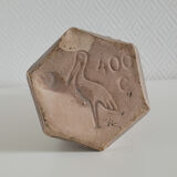 Old hexagonal sandstone bottles