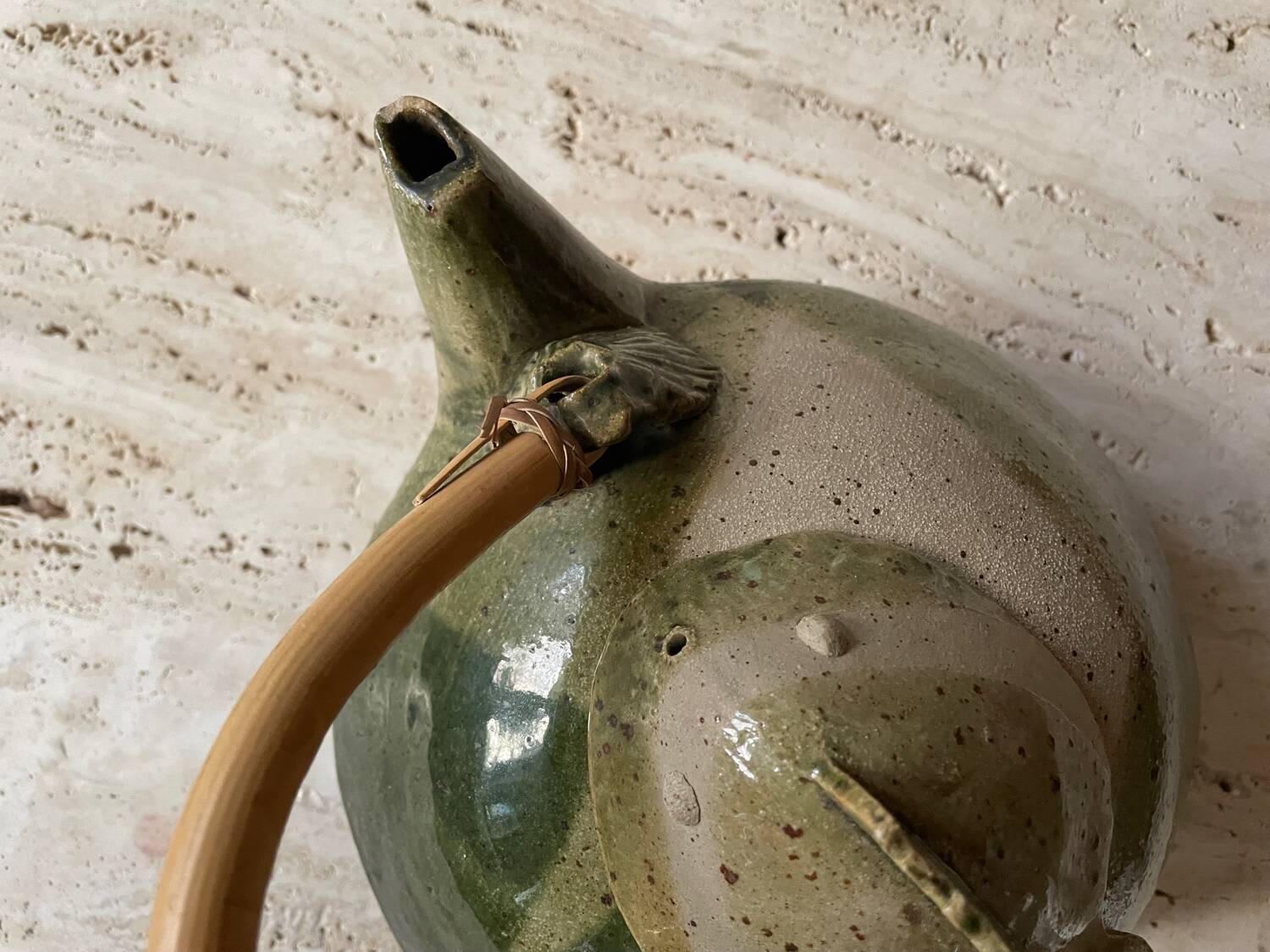 Handmade ceramic teapot with green fish and bamboo