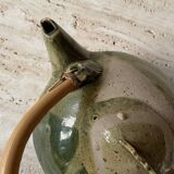 Handmade ceramic teapot with green fish and bamboo