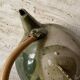 Handmade ceramic teapot with green fish and bamboo