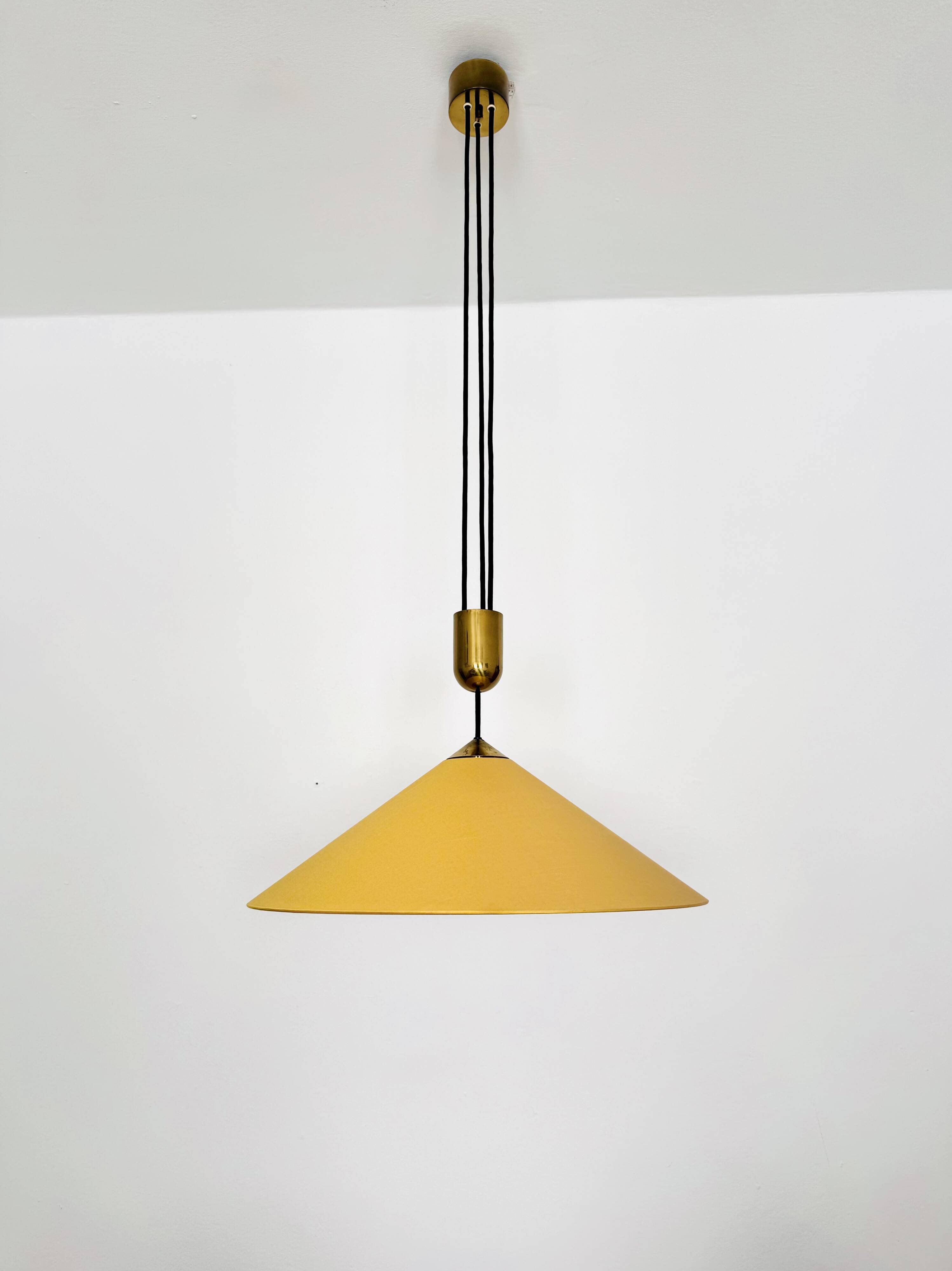 Adjustable Pendant Lamp with Counterweight by Florian Schulz