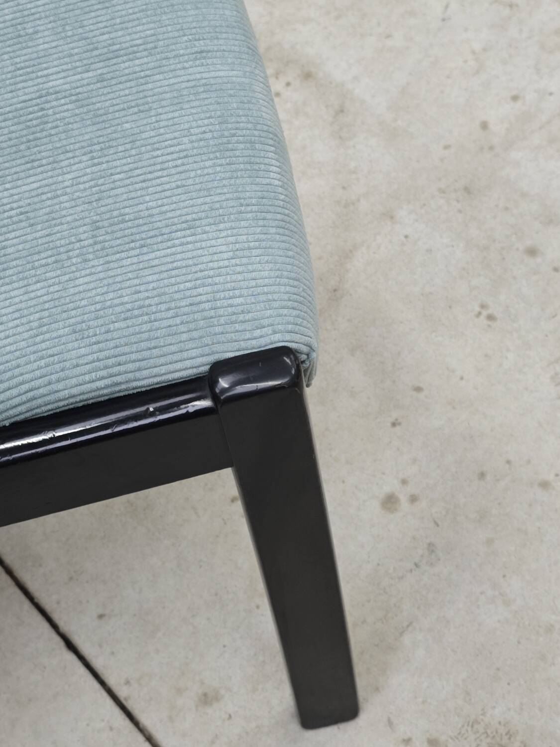 Set of 4 modernist black chairs with light blue ribbed fabric