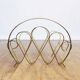 Magazine rack in brass 60