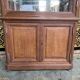 Buffet deux corps vitrine de magasin chêne 1900