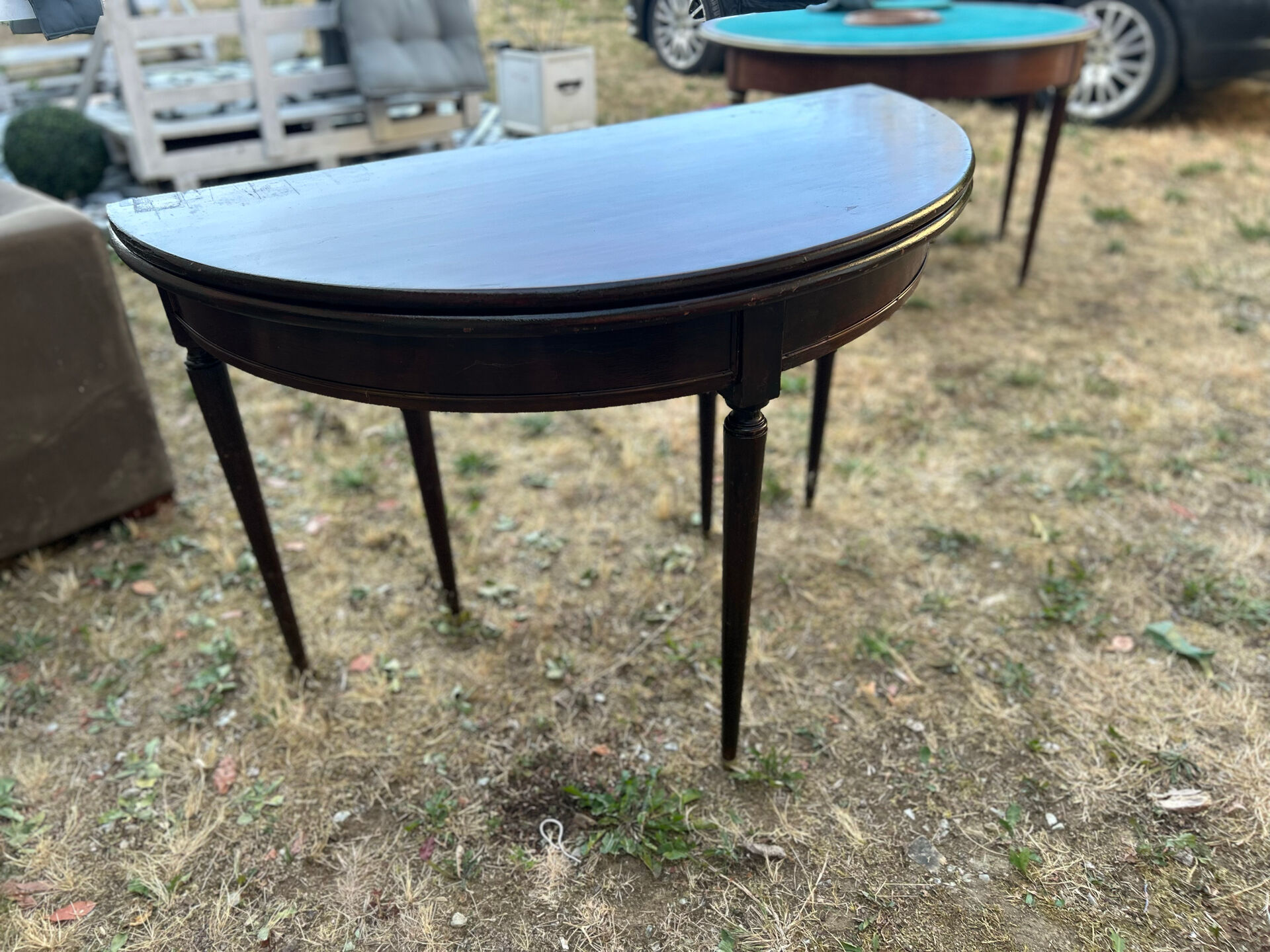 Half-moon table in mahogany, Louis XVI style.