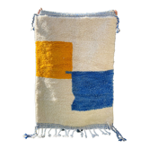 Berber carpet Béni ouarain white with abstract patterns mustard yellow and blue