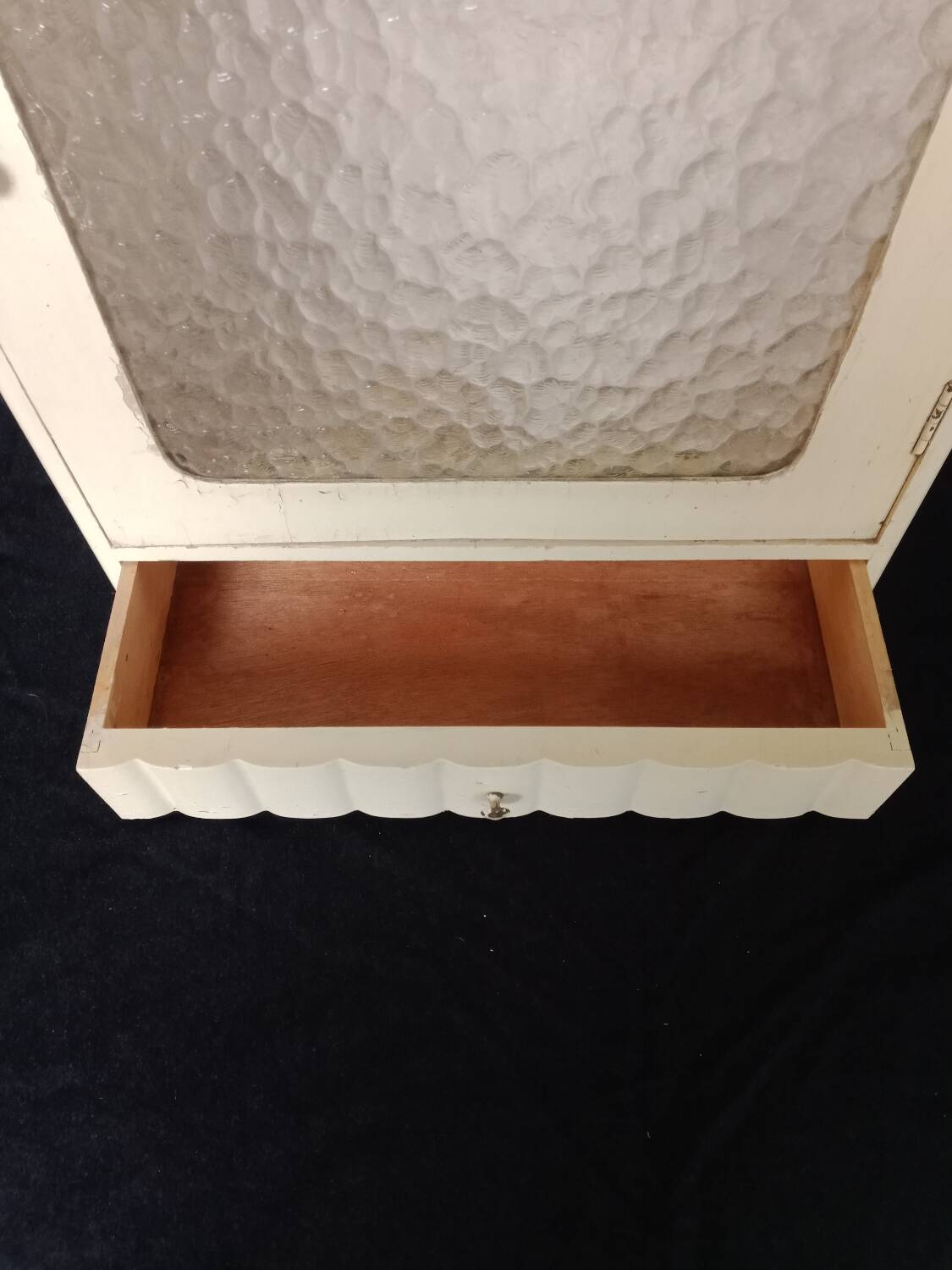 Old wall cabinet with one door and one drawer