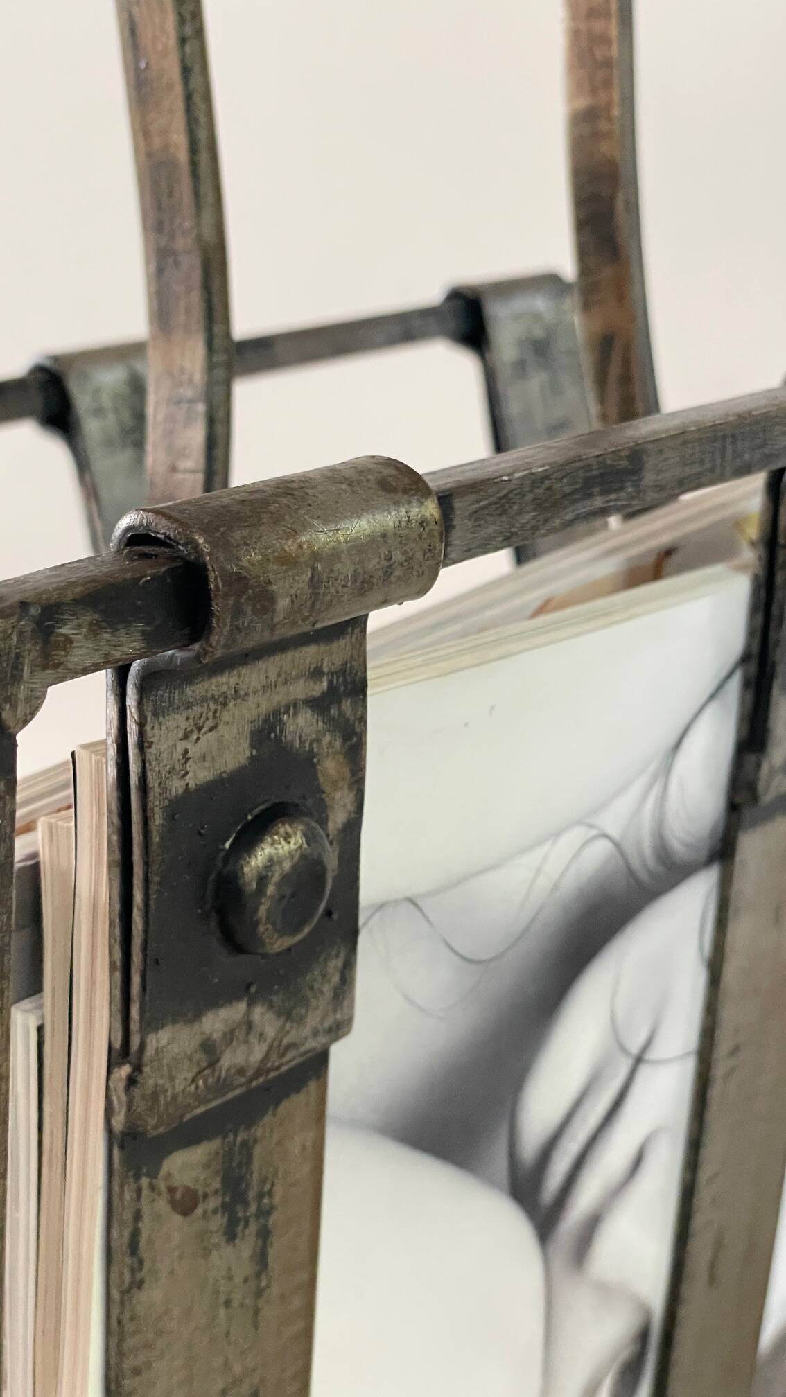 Brutalist vintage steel magazine rack