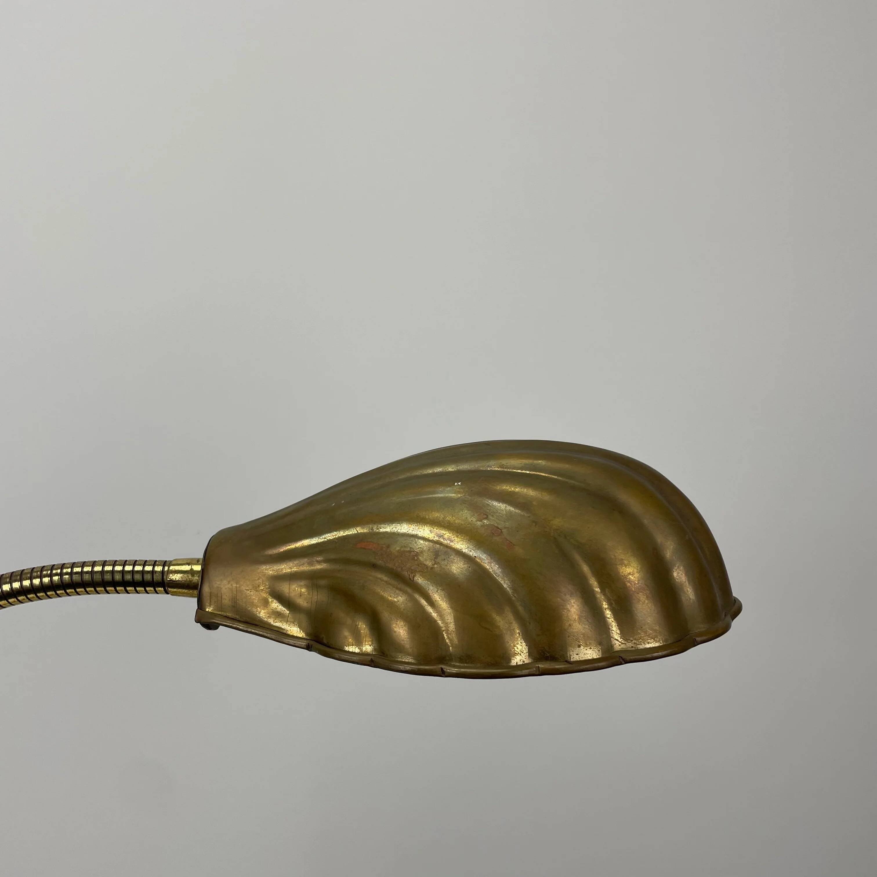 French table lamp in brass with a shell-shaped shade from the 1950s.
