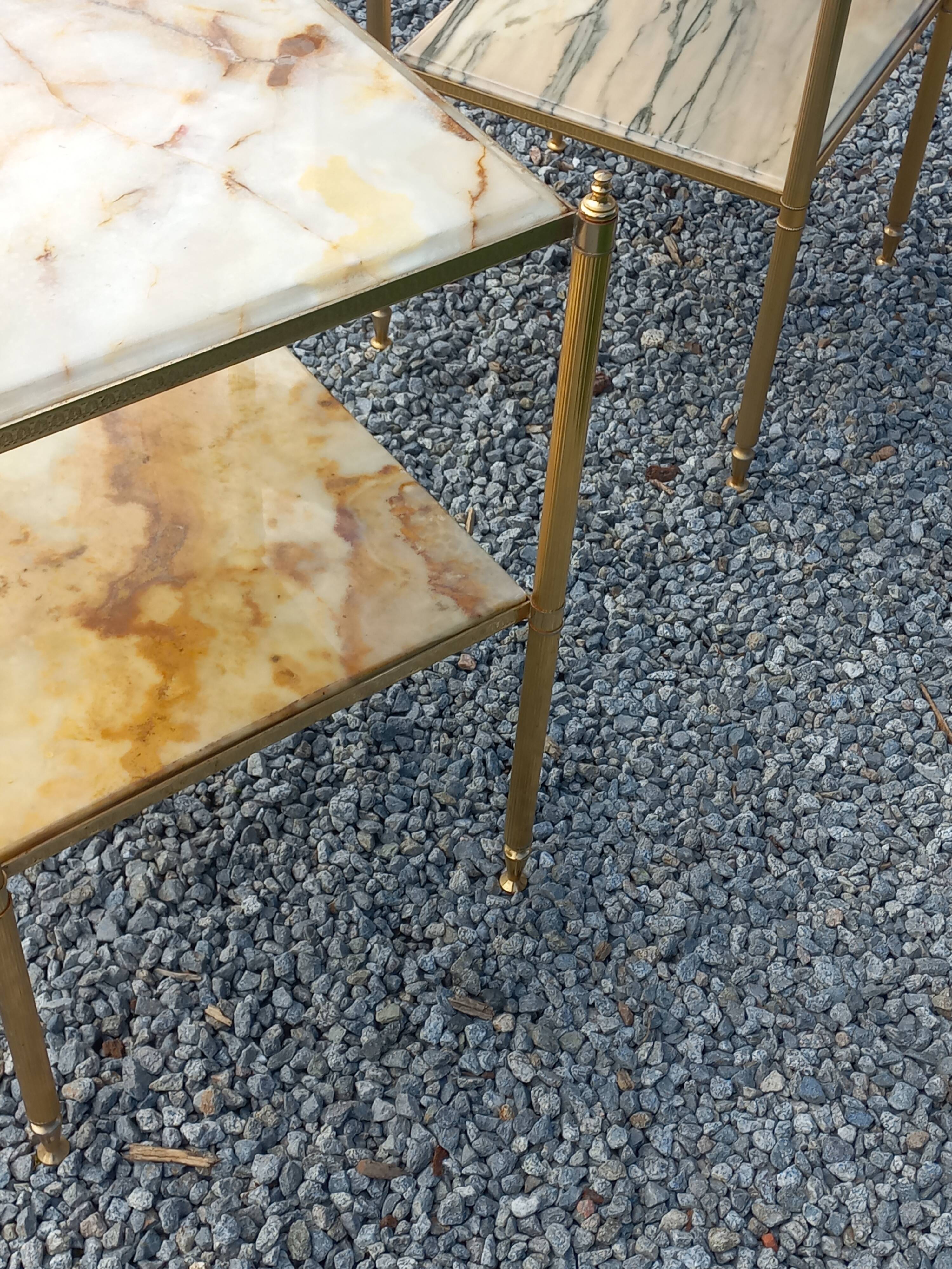 Pair of neoclassical side tables in bronze, brass, marble, and o.