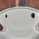 Old white enamelled hand washbasin or gardener enamel garden