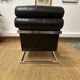 Vintage 1970s black leather armchair – metal frame