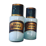 Two old pharmacy jars