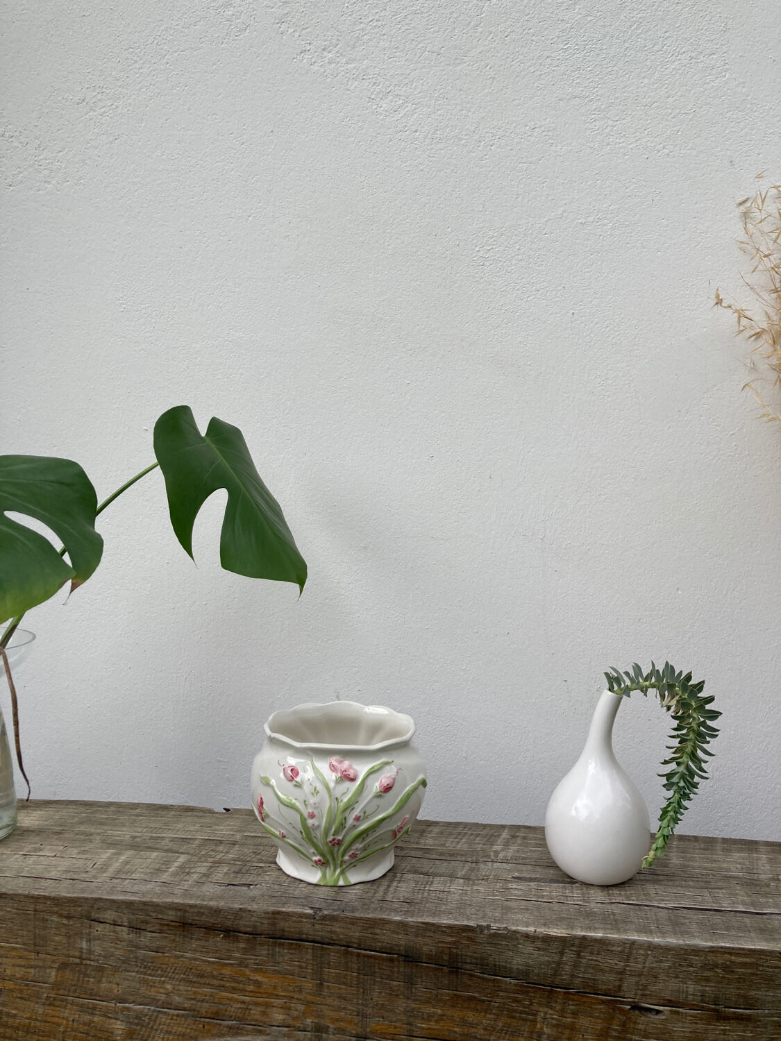 White ceramic pot cache in old flower slip