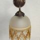 French vintage bronze effect single wall light with opaque beaded glass shade.