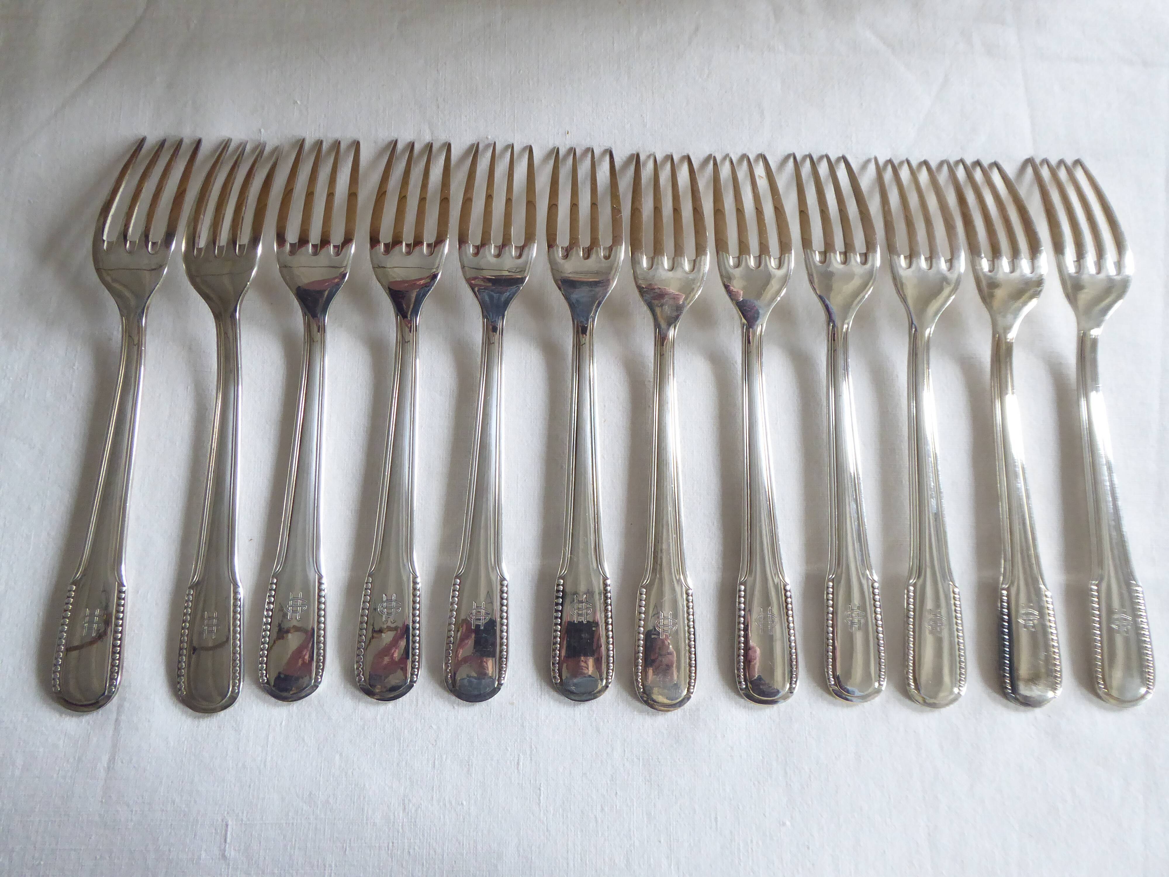 12 dessert forks, silver metal