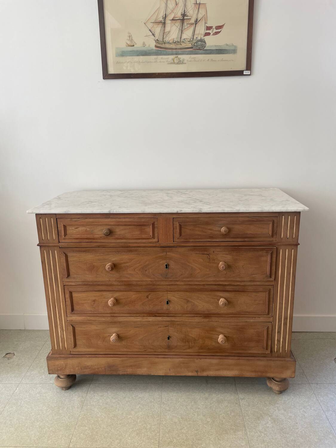 Sandblasted chest of drawers with white marble top