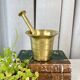 Large brass mortar with pestle