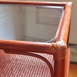 Varnished rattan coffee table and smoked glass top