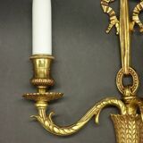 Paire d'appliques au noeud style Louis XVI - bronze