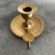 Hand candlestick in massive brasse