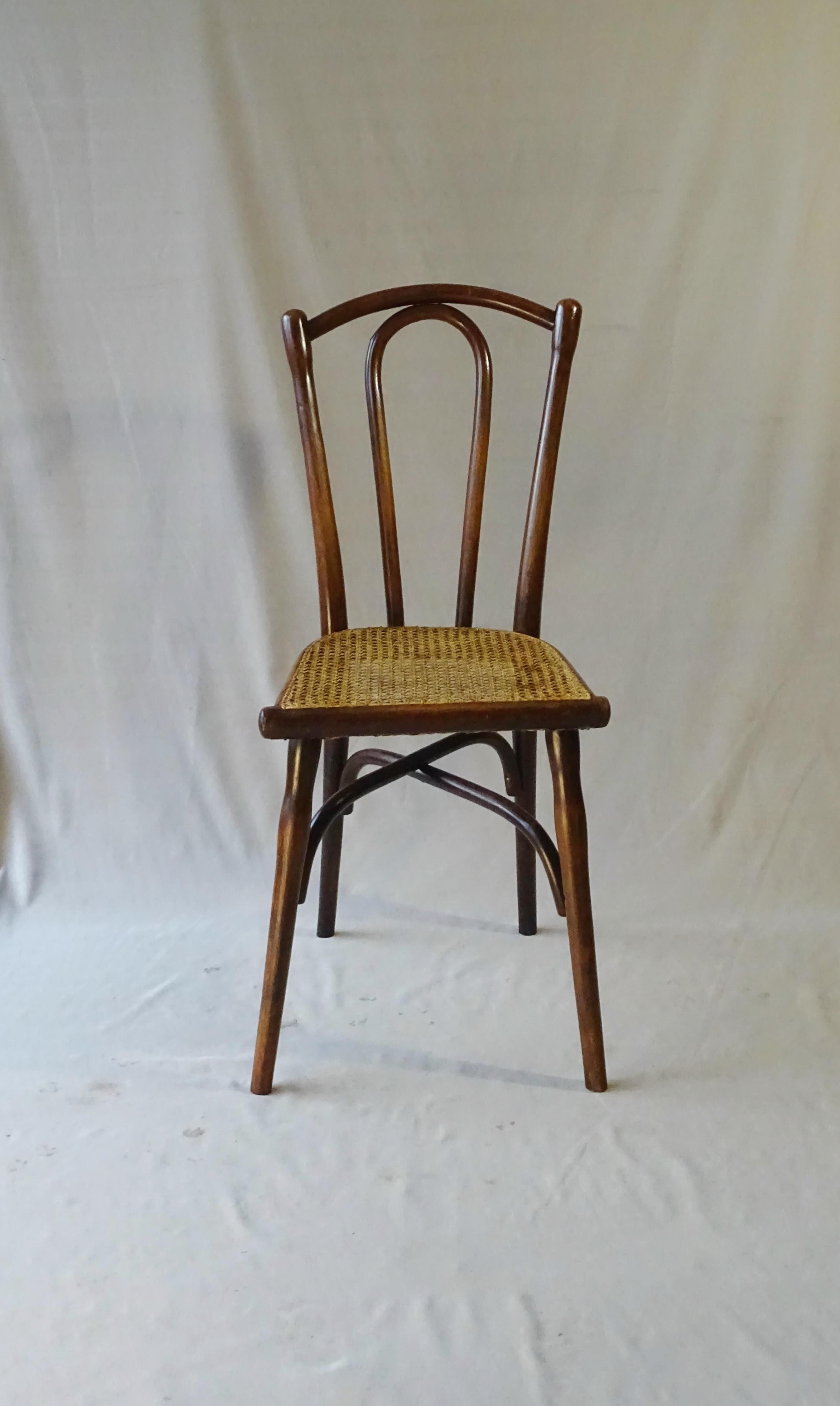 Chaise bistrot  Thonet N°118 pieds compas 1895, cannée