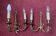 two brass wall sconces