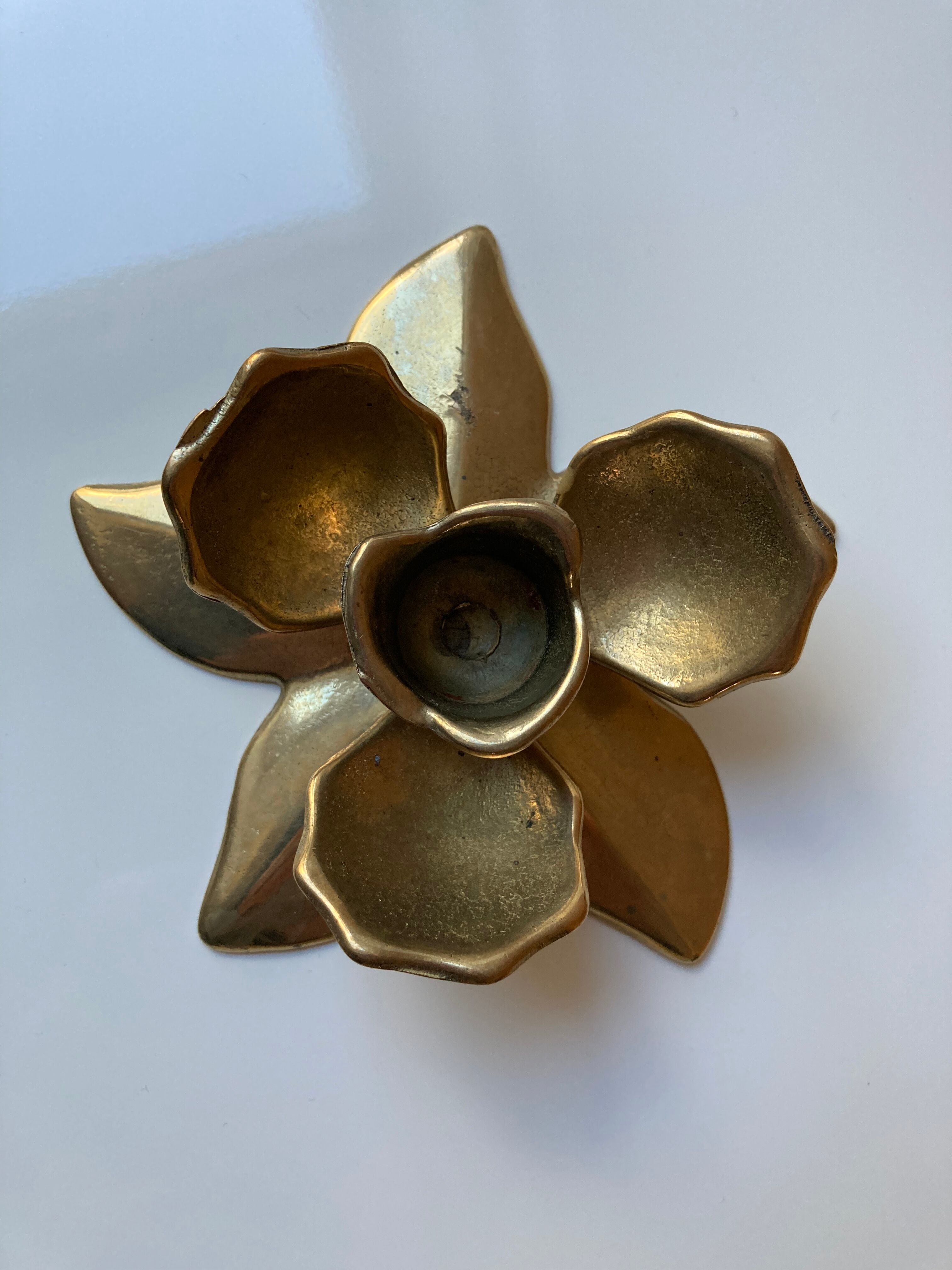 Brass flower candle holder