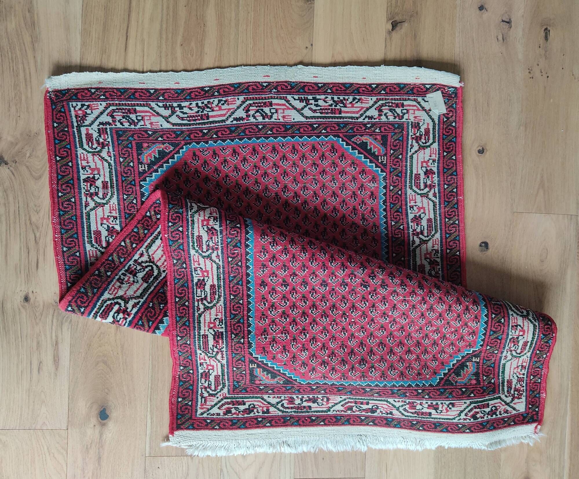 Oriental carpet 79 x 130 cm
