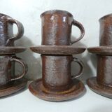 coffee service in iridescent stoneware cups and vintage sugar bowl