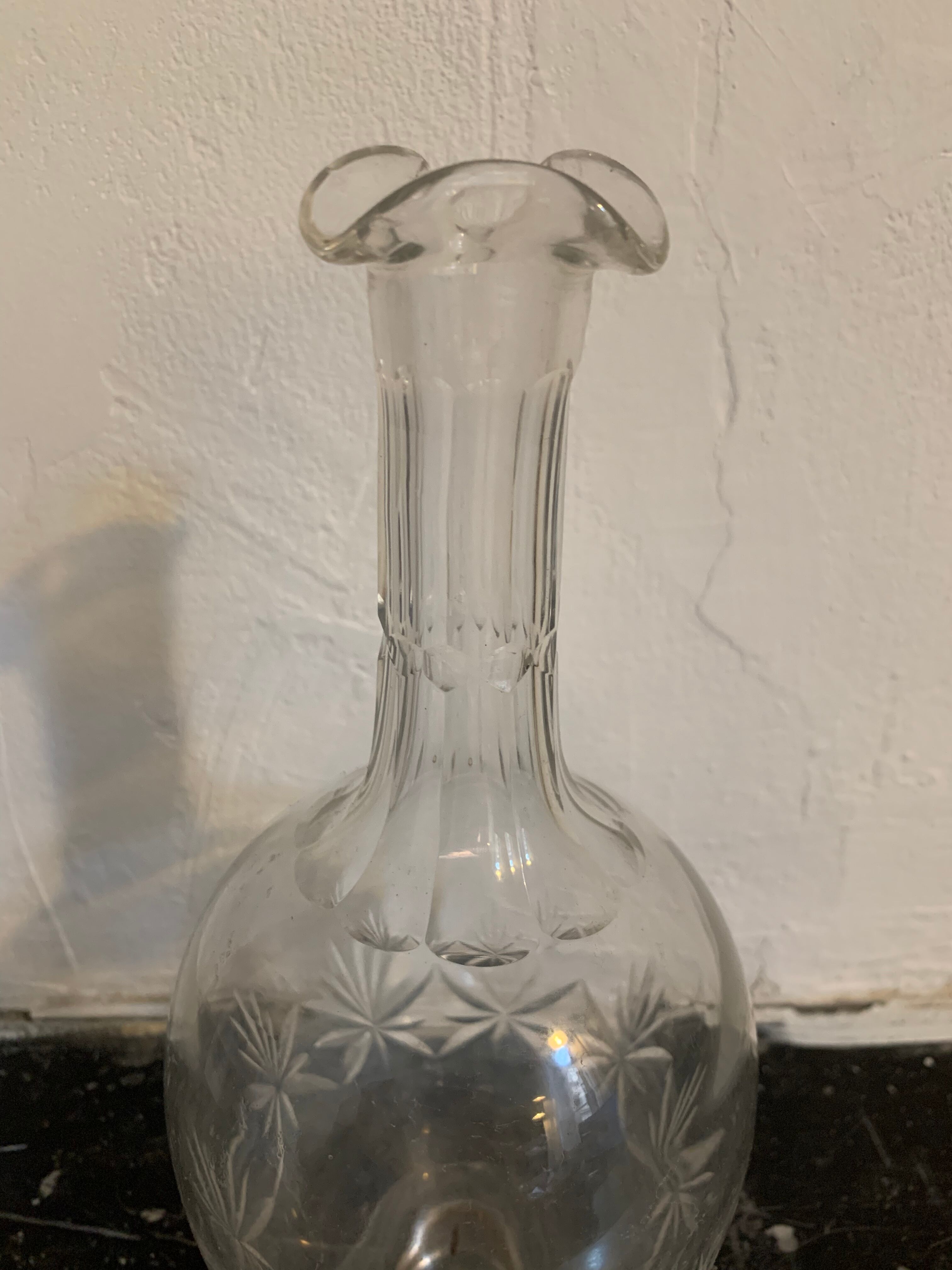 Old chiseled glass carafe