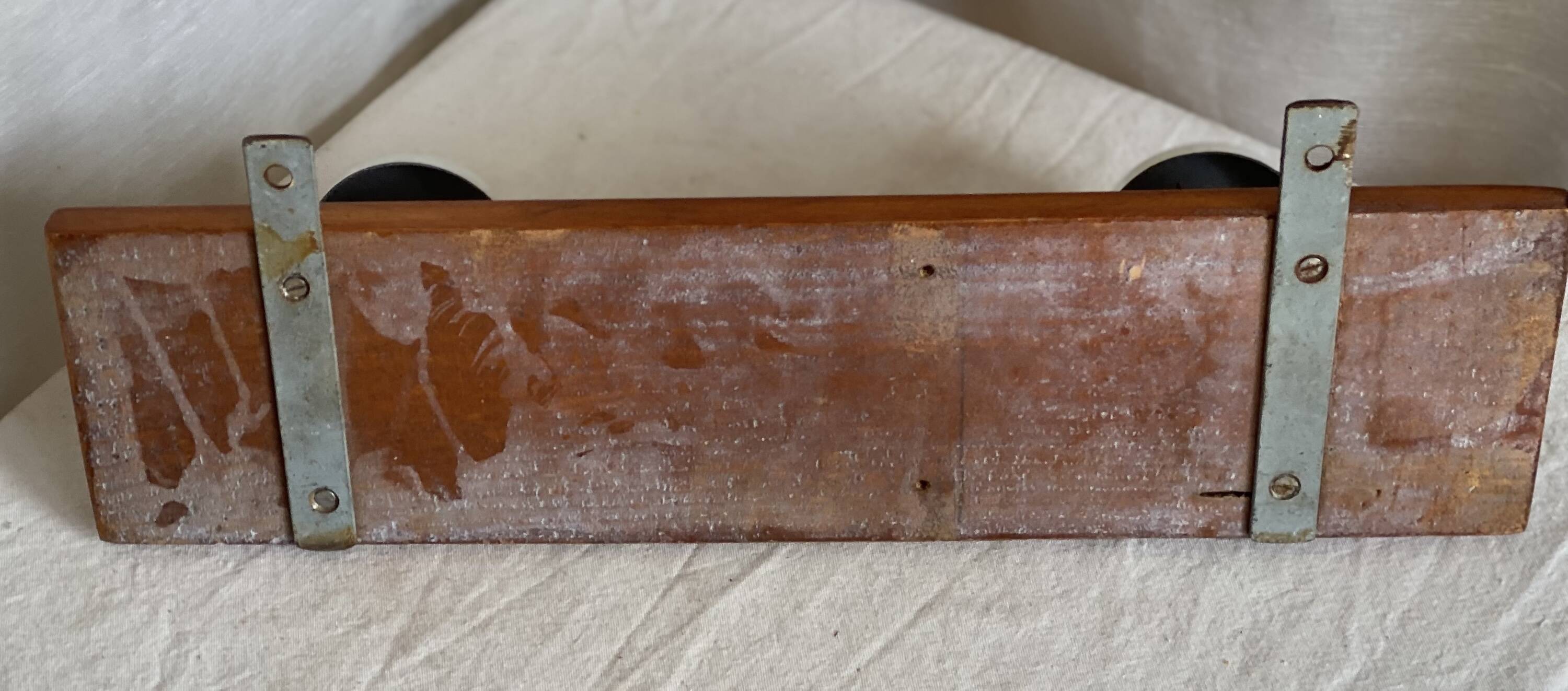 Wall-mounted coat rack with 2 hooks, vintage 1960s white lacquered metal.