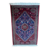 Small Persian wool rug