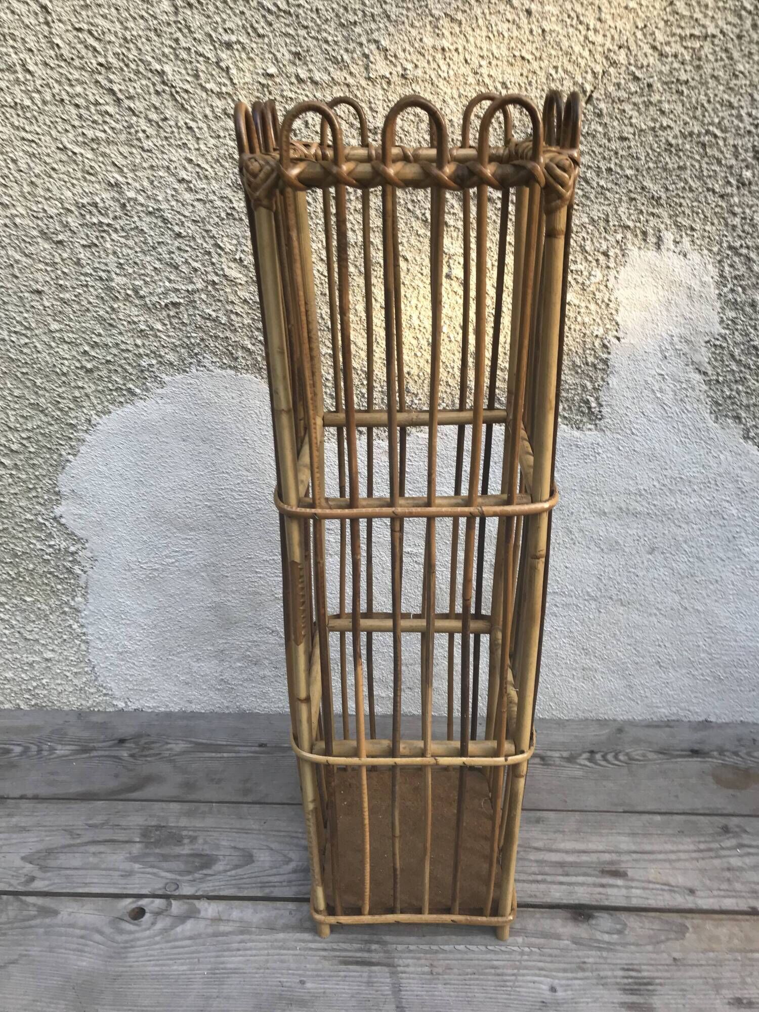 Old woven rattan umbrella holder from the 60's