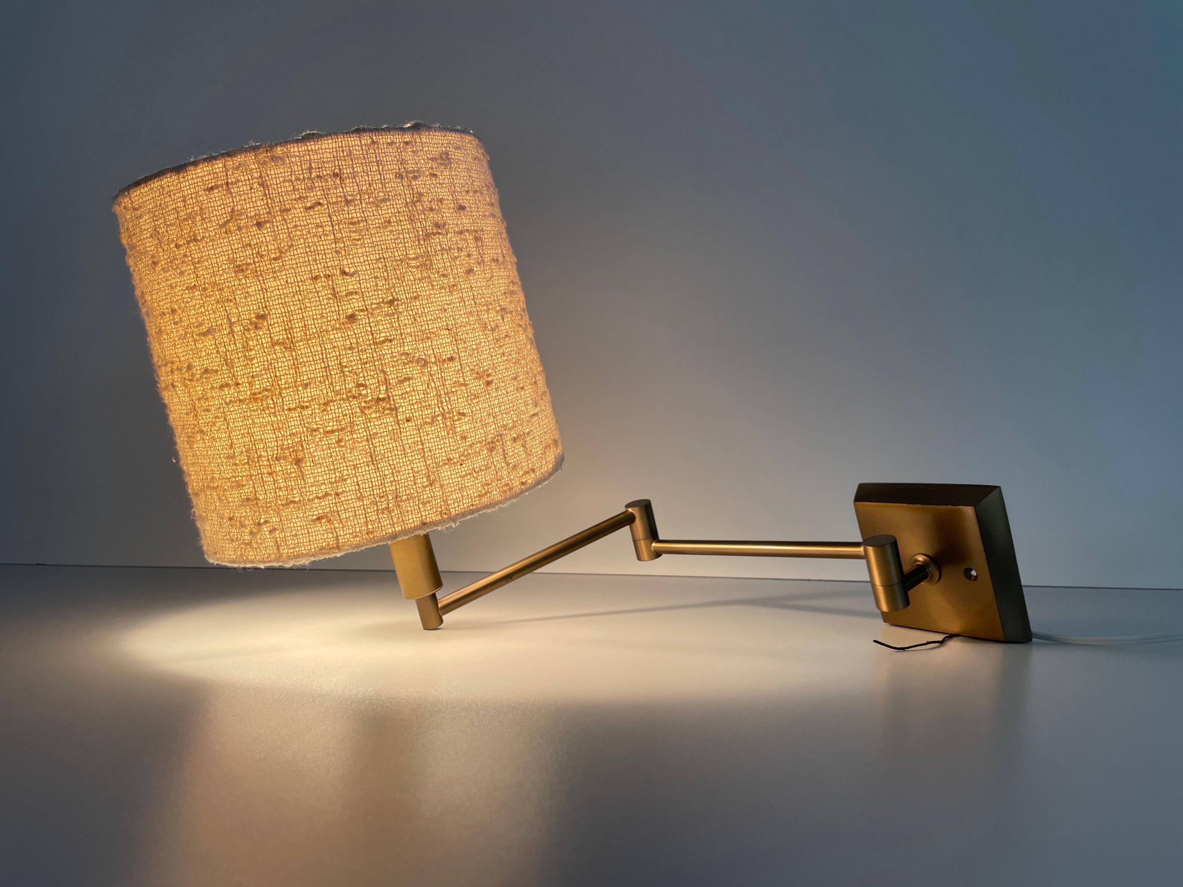 Adjustable brass wall lamp with fabric shade, Danish design, 1970s, Denmark.