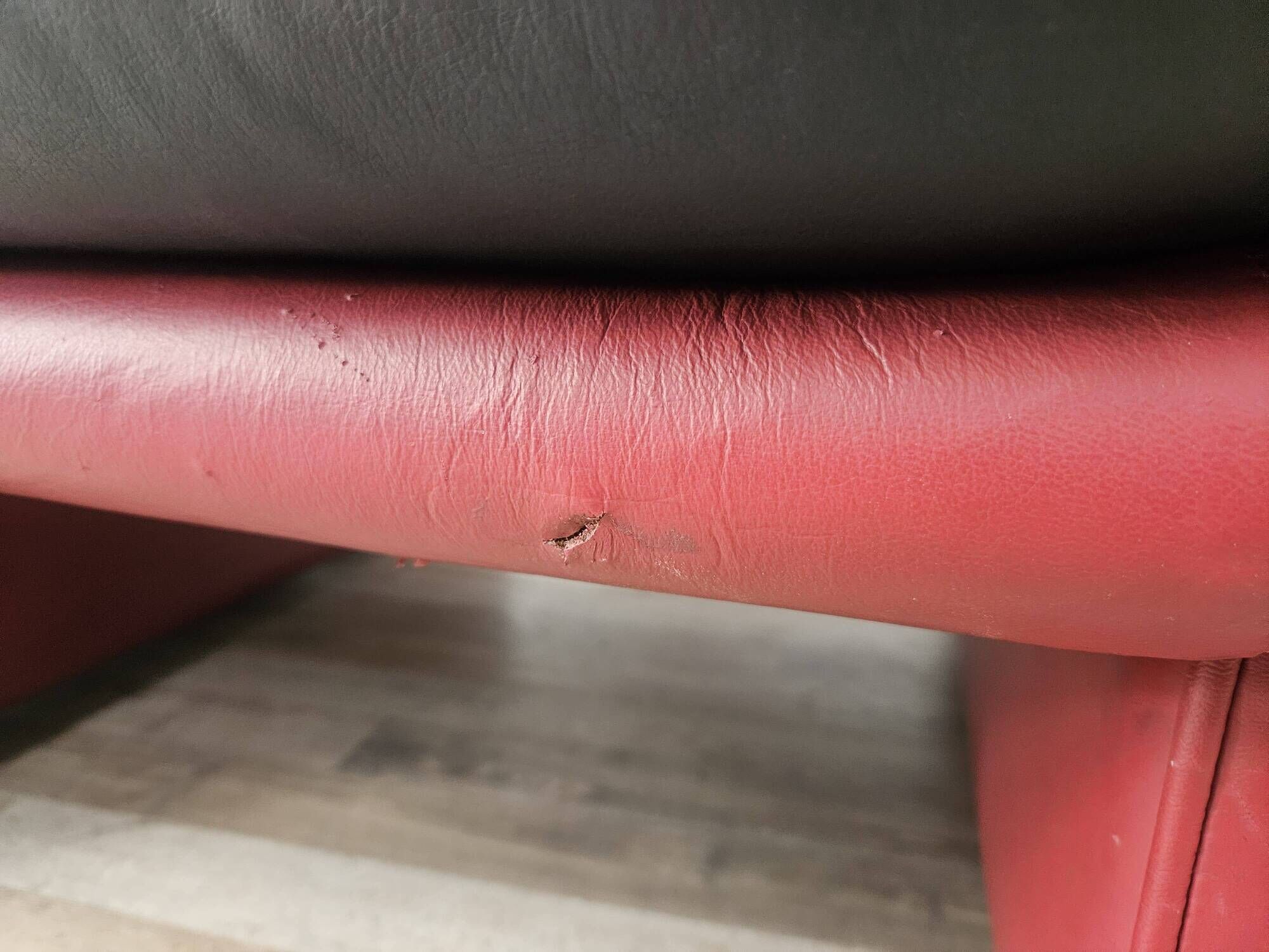 Red and black leather armchair by Nicoletti Salotti