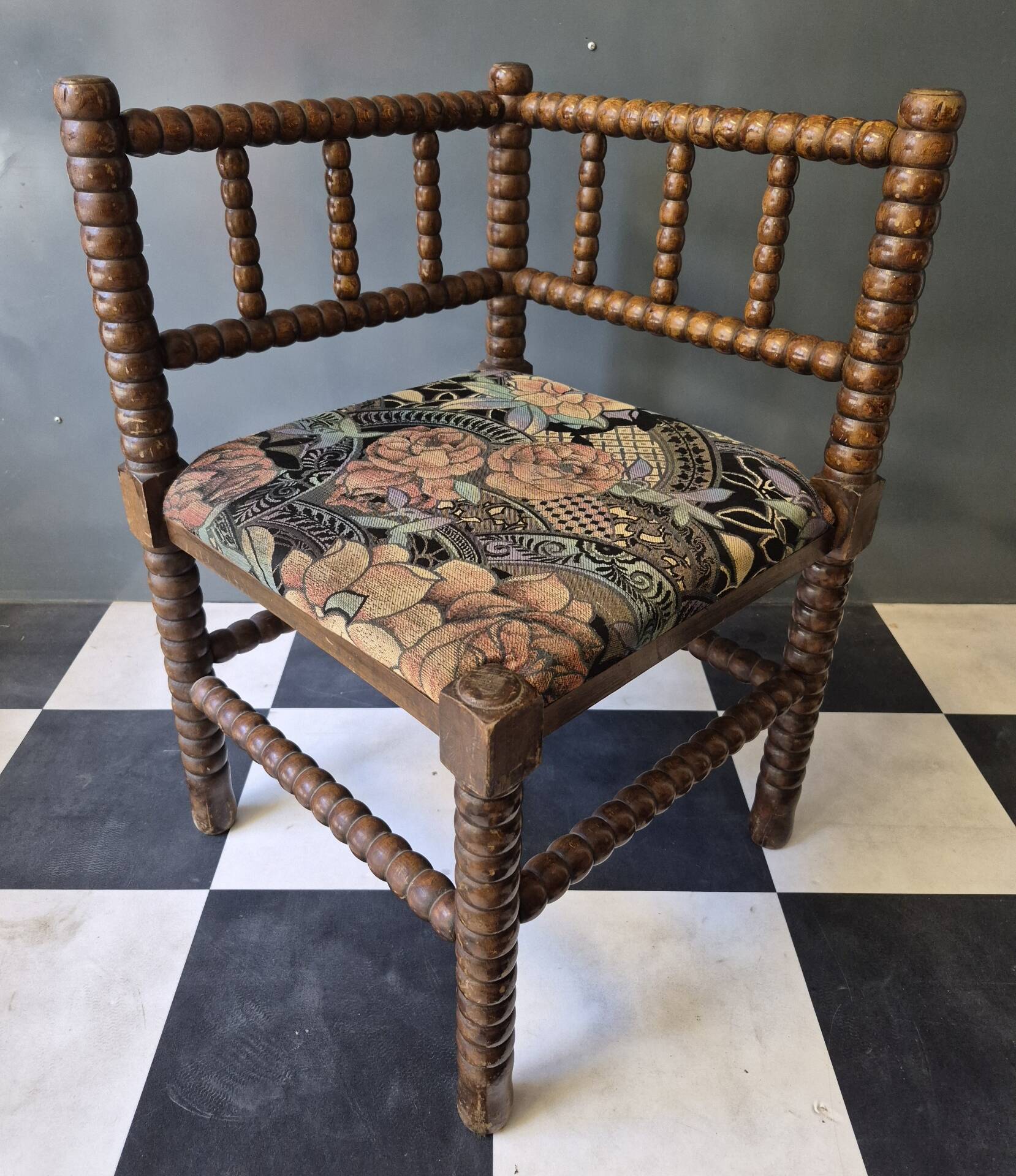 Old pair of corner chairs known as 'fireplace corner' armchairs.