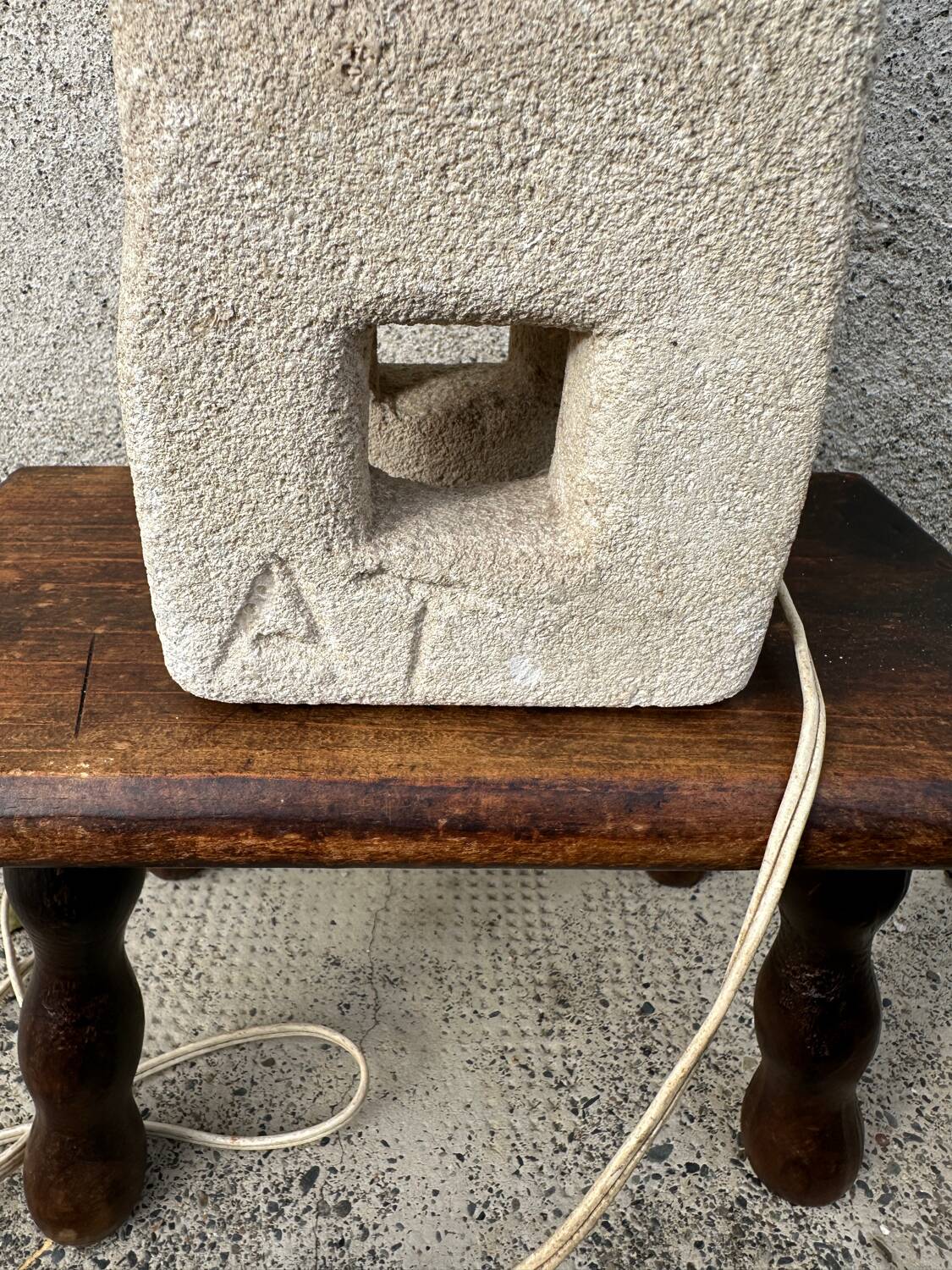 Anthropomorphic stone table lamp brutalised by Albert Tormos.