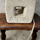 Anthropomorphic stone table lamp brutalised by Albert Tormos.