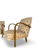 Ensemble de fauteuils Art Déco avec accoudoirs en hêtre arqués.