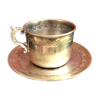 Silver metal cup and saucer