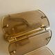 Pair of brass and smoked glass wall lights