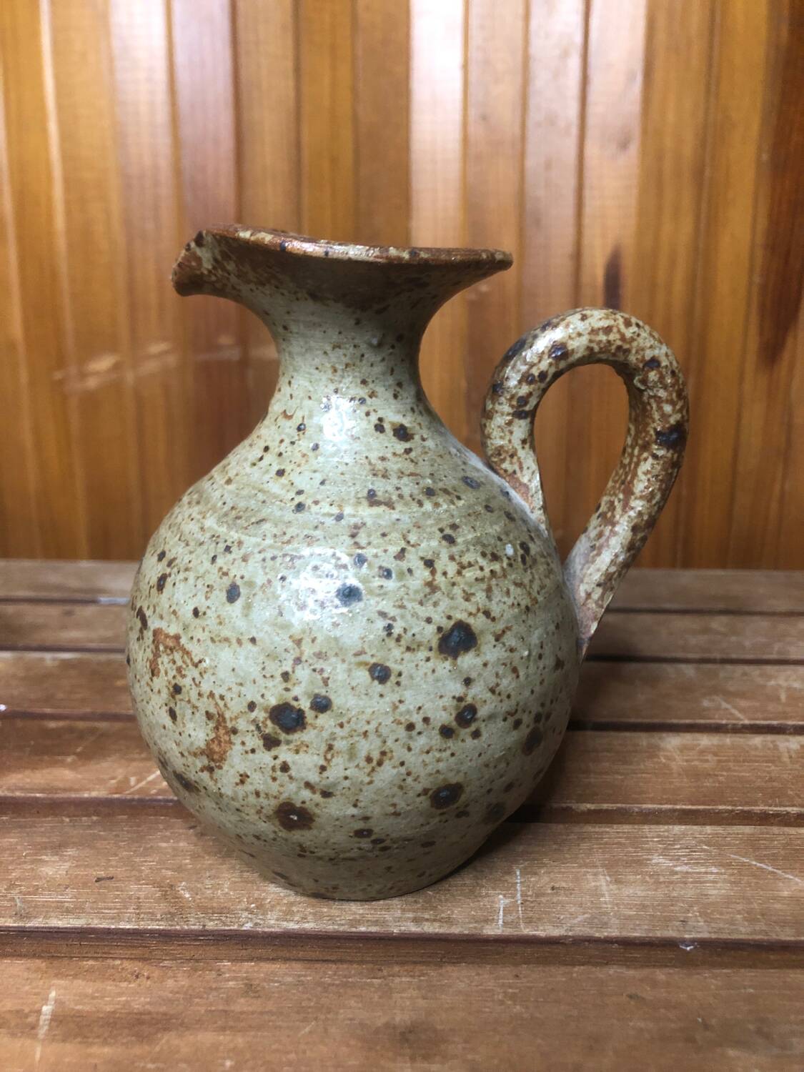 Old vintage brown stoneware pitcher