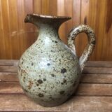 Old vintage brown stoneware pitcher